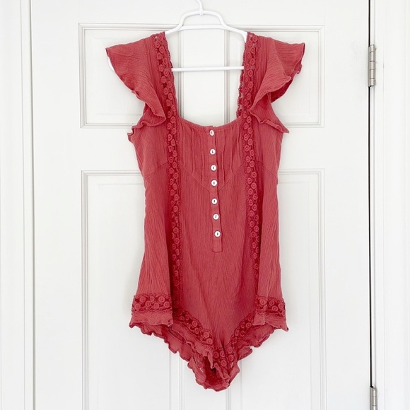Free People Pants - FREE PEOPLE romper size M orange sleeveless ruffles shorts bodysuit